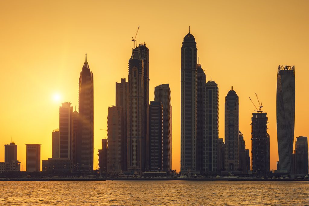 View of Dubai with sun